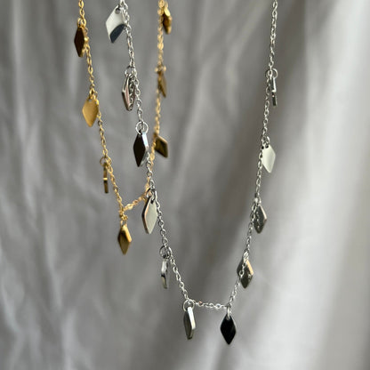 Silver and gold sparkly tassel necklace